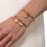 Asterales Gold Solitaire Charm Cuff Bracelet