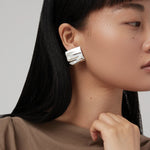 Sundra Clip On Earrings Silver Dipped Brass