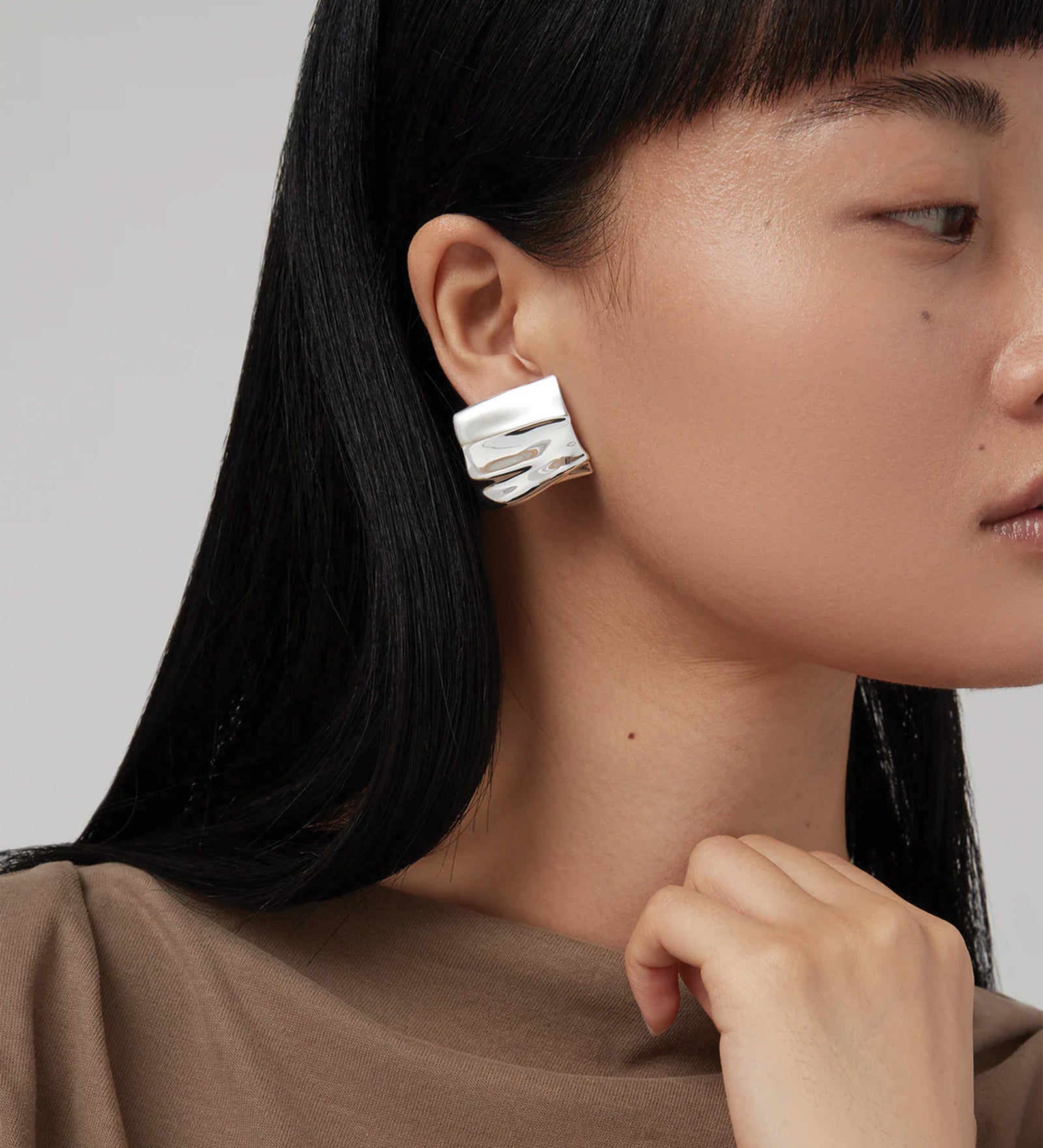Sundra Clip On Earrings Silver Dipped Brass