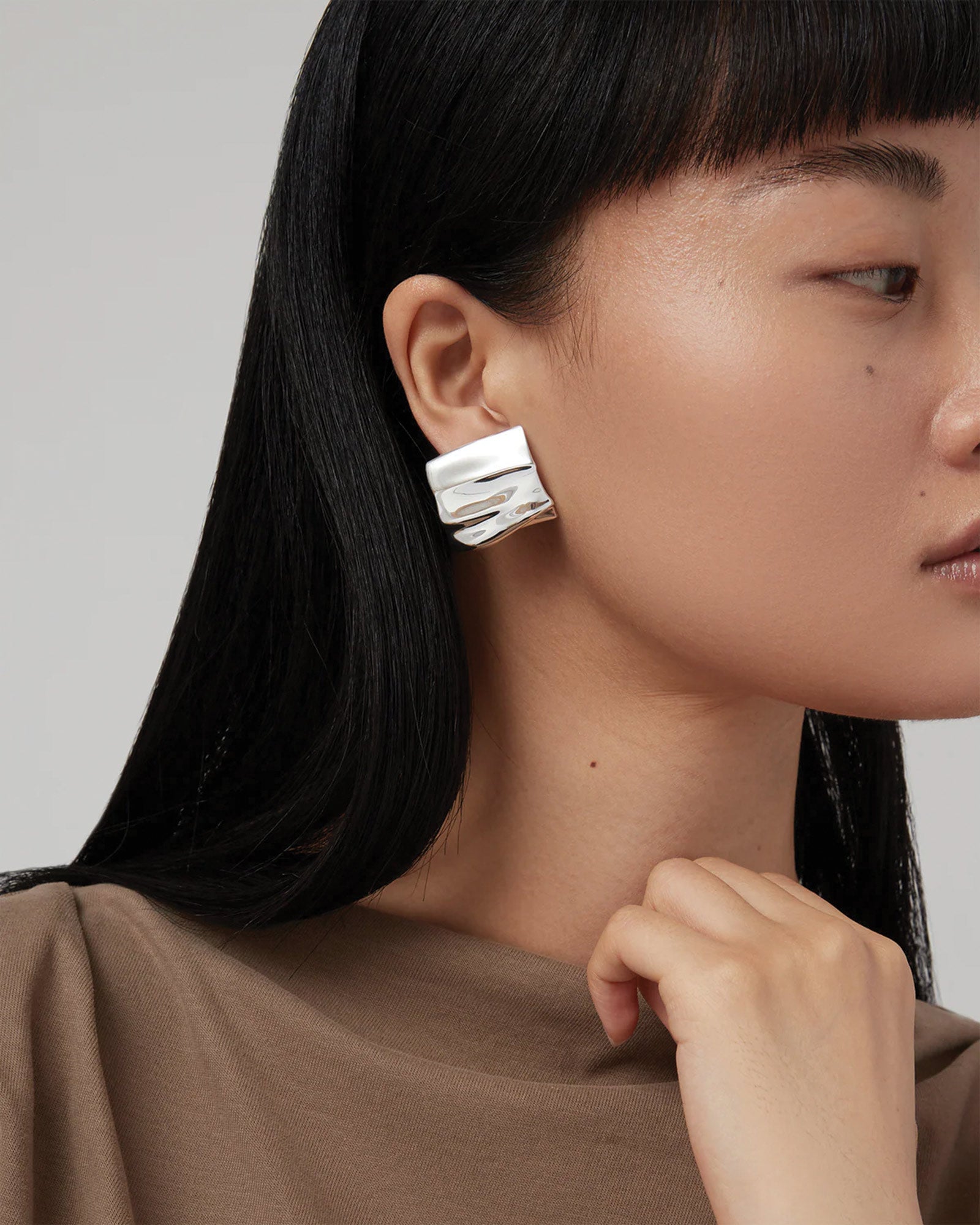 Sundra Clip On Earrings Silver Dipped Brass