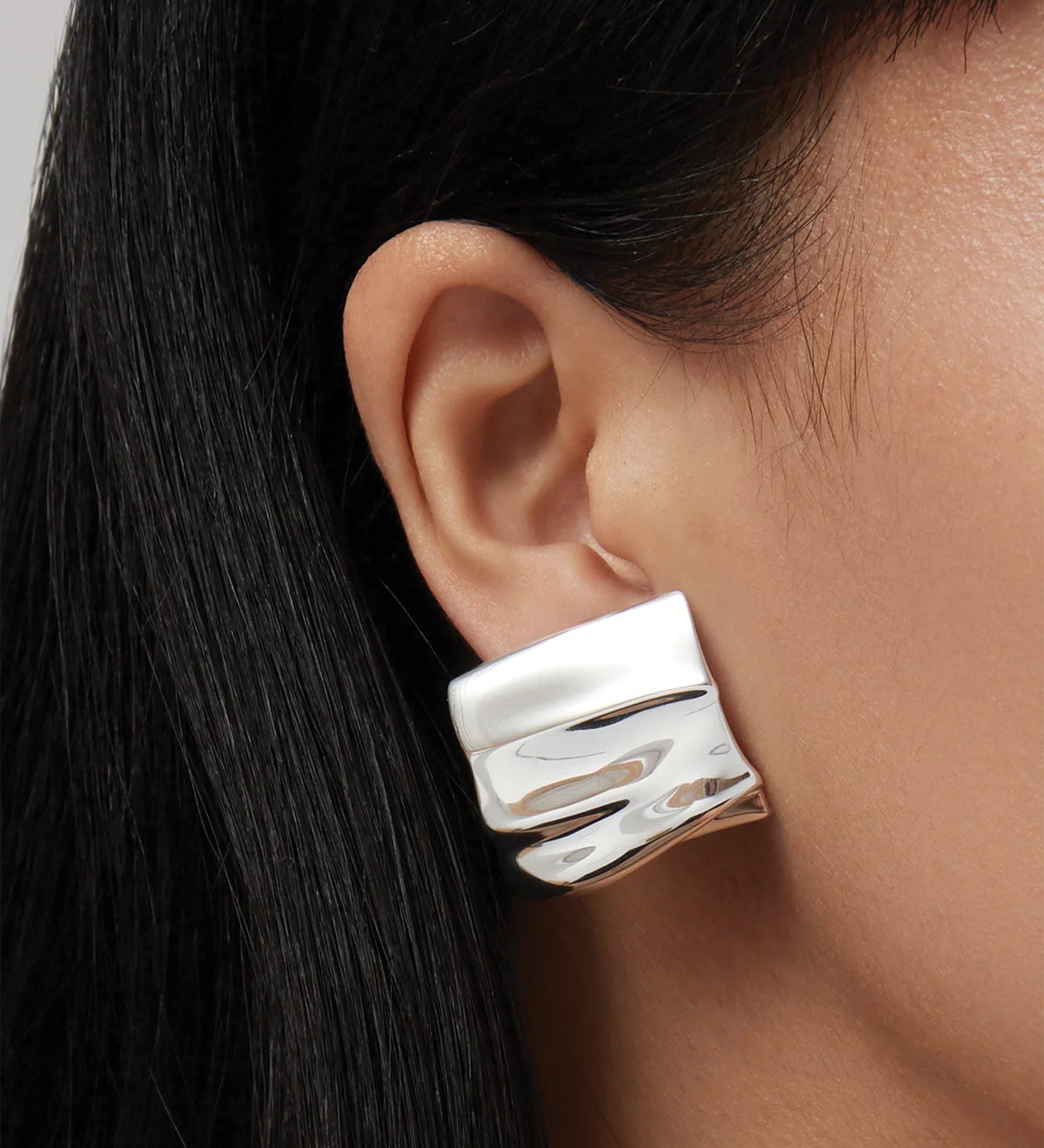 Sundra Clip On Earrings Silver Dipped Brass