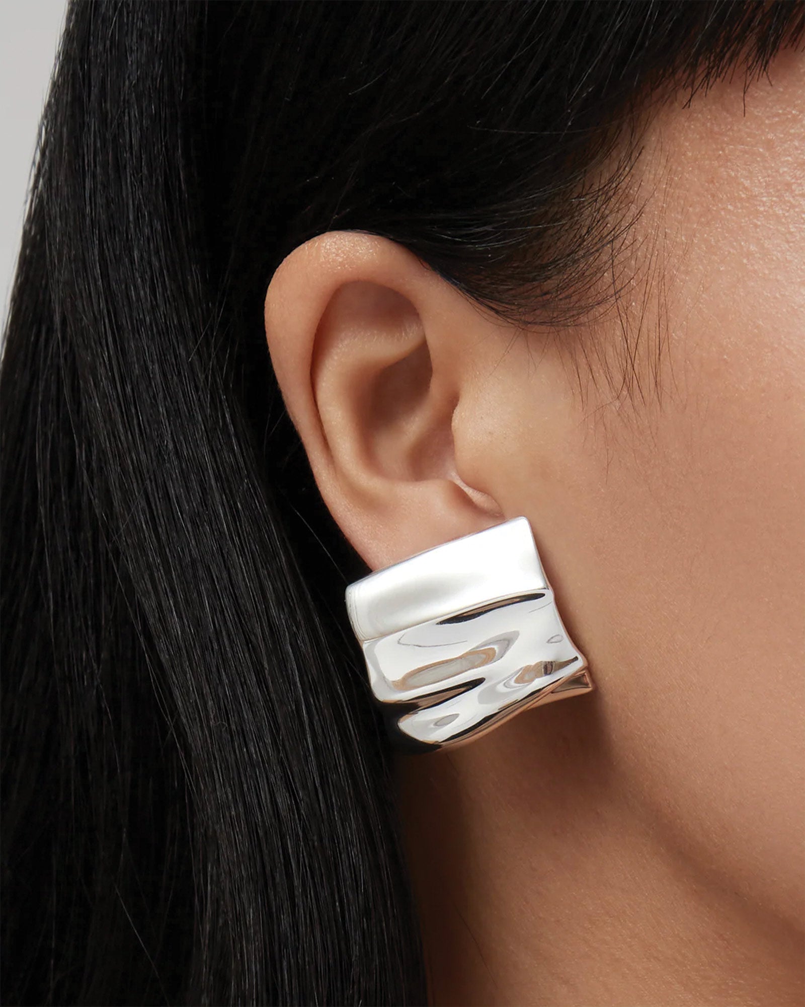 Sundra Clip On Earrings Silver Dipped Brass
