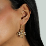 La Vie Parisienne-Four Petal Ribbon Crystal Hooks-Earrings-14k Gold Plated, White Crystal-Blue Ruby Jewellery-Vancouver Canada