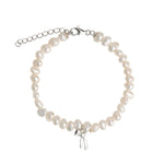 Quiet Icon-Bow Drop Pearl Bracelet-Bracelets-Rhodium Plated Sterling Silver, White Pearl-Blue Ruby Jewellery-Vancouver Canada