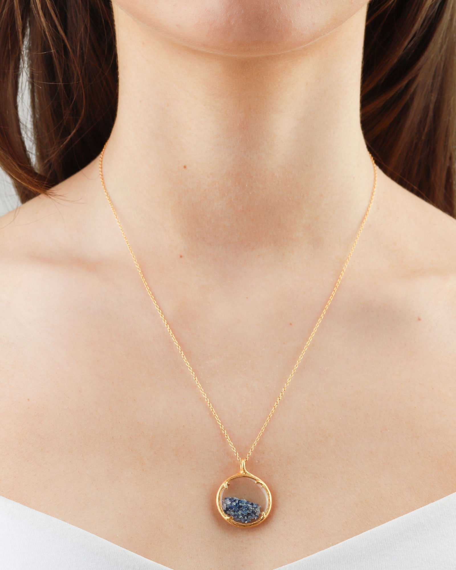 Hen with sapphire pendant on sale