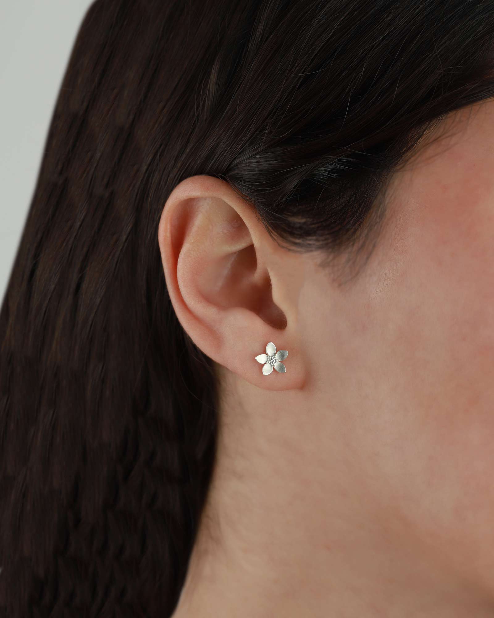 Tashi-Blossom Studs-Earrings-Brushed Sterling Silver, Cubic Zirconia-Blue Ruby Jewellery-Vancouver Canada