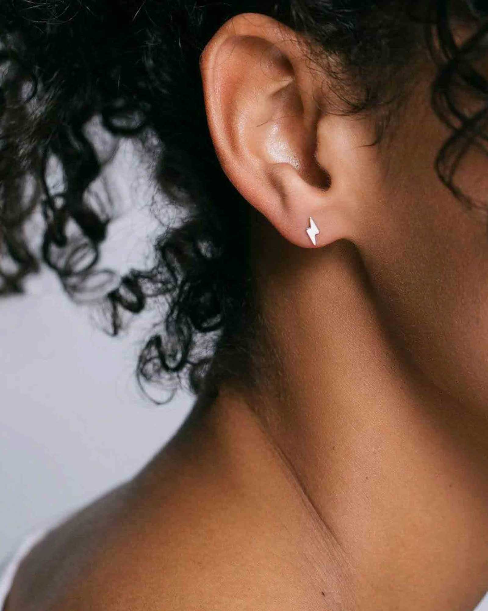 Kris Nations Lightning Bolt Stud Earrings Silver Blue Ruby