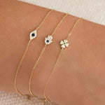 Quiet Icon-Tiny Evil Eye CZ Bracelet-Bracelets-14k Gold Vermeil, White Cubic Zirconia, Blue Cubic Zirconia-Blue Ruby Jewellery-Vancouver Canada