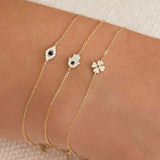 Quiet Icon-Tiny Evil Eye CZ Bracelet-Bracelets-14k Gold Vermeil, White Cubic Zirconia, Blue Cubic Zirconia-Blue Ruby Jewellery-Vancouver Canada